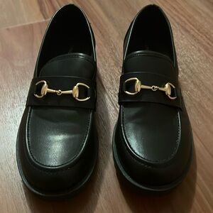 Black loafers